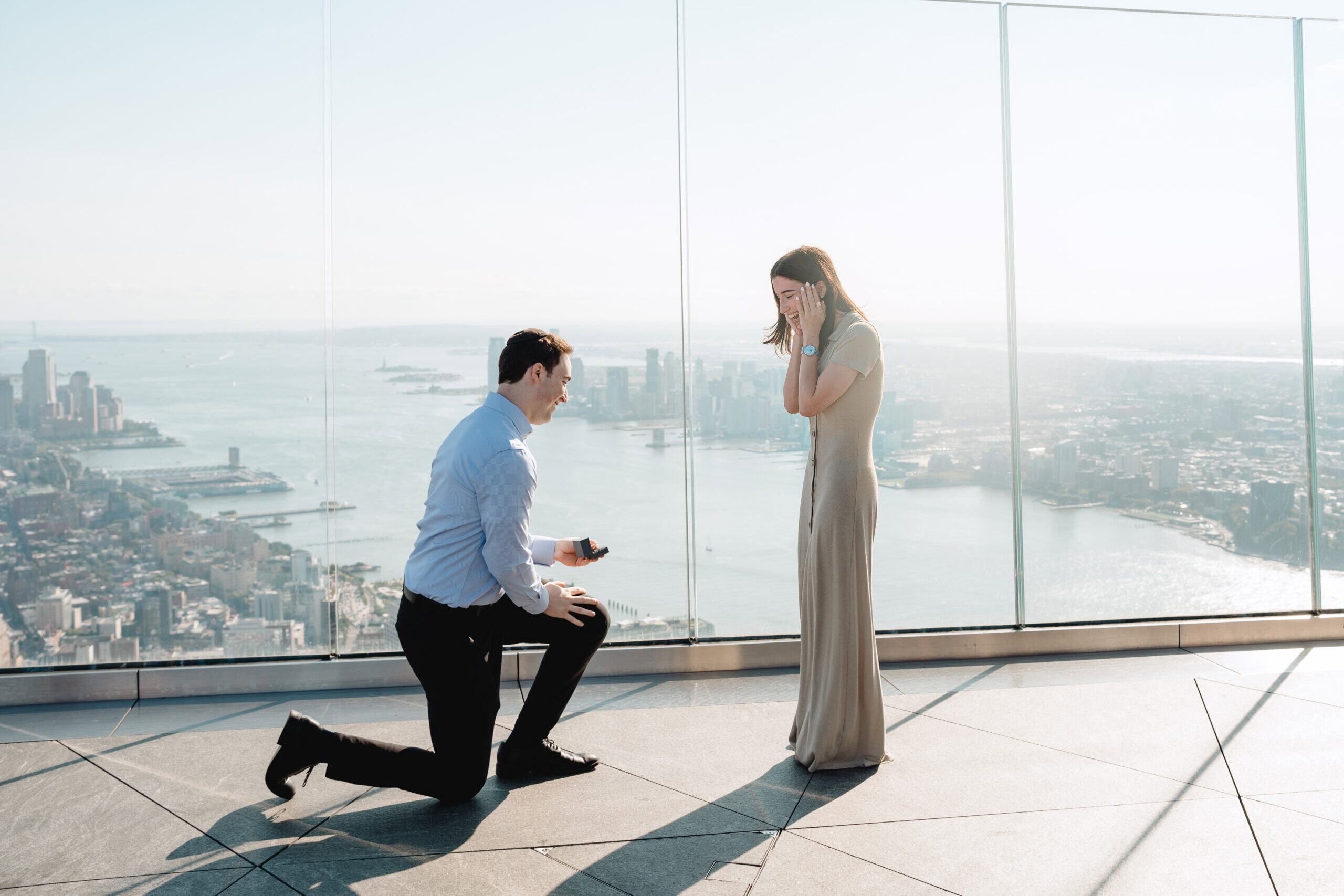 Rooftop surprise proposal with panoramic city views